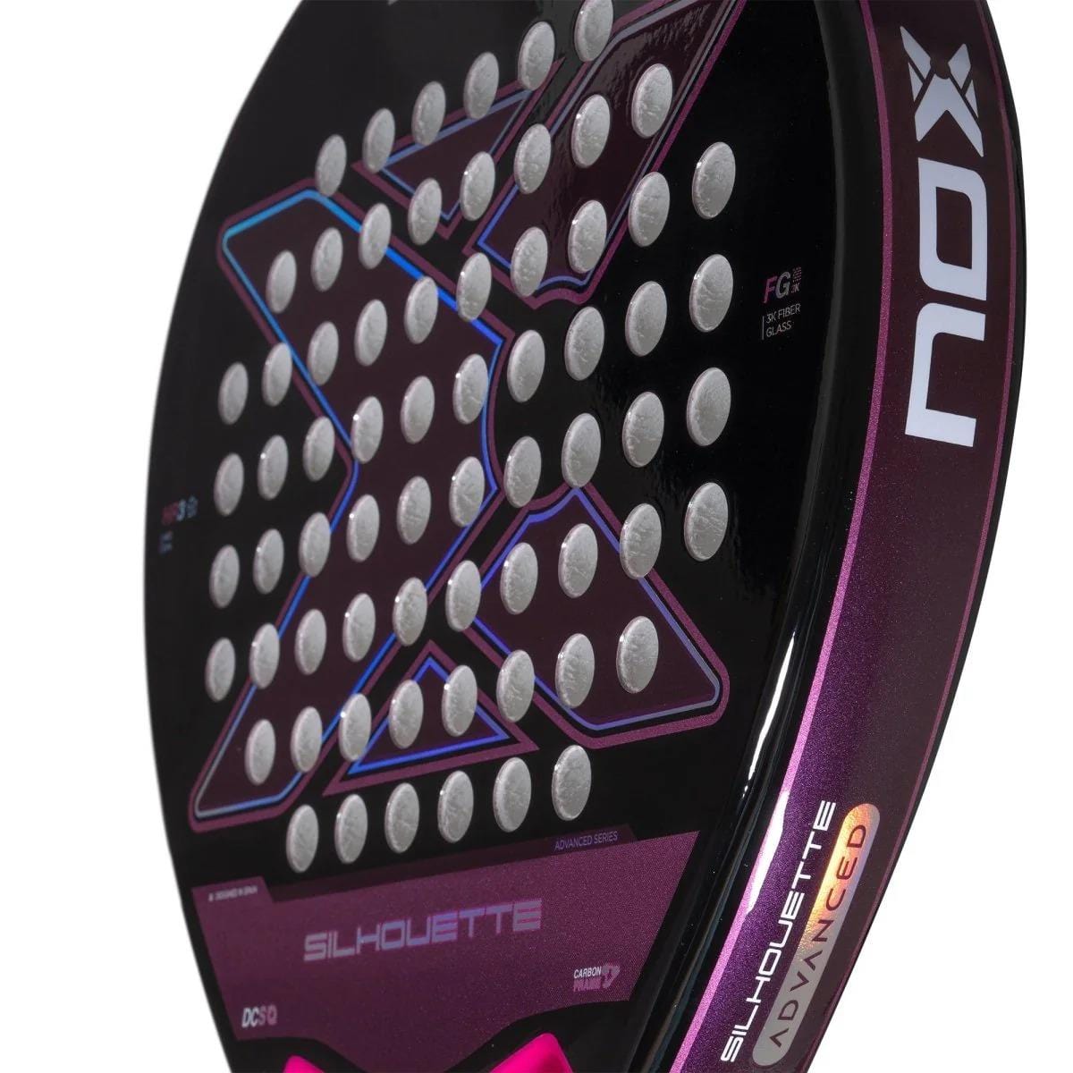 Close-up of the NOX X-One Silhouette Advance Series Padel Racket in black and pink, with multiple round holes on its Fibre Glass 3K face and branded details, designed by NOX with an HR3 core.