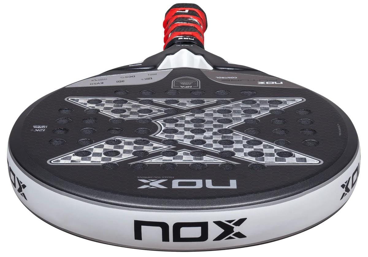 Close-up of the NOX NFA Future Control 12K Alum Padel Racket in black and white, featuring a large silver "X," red and black grip, and NOX branding on the face and edge.