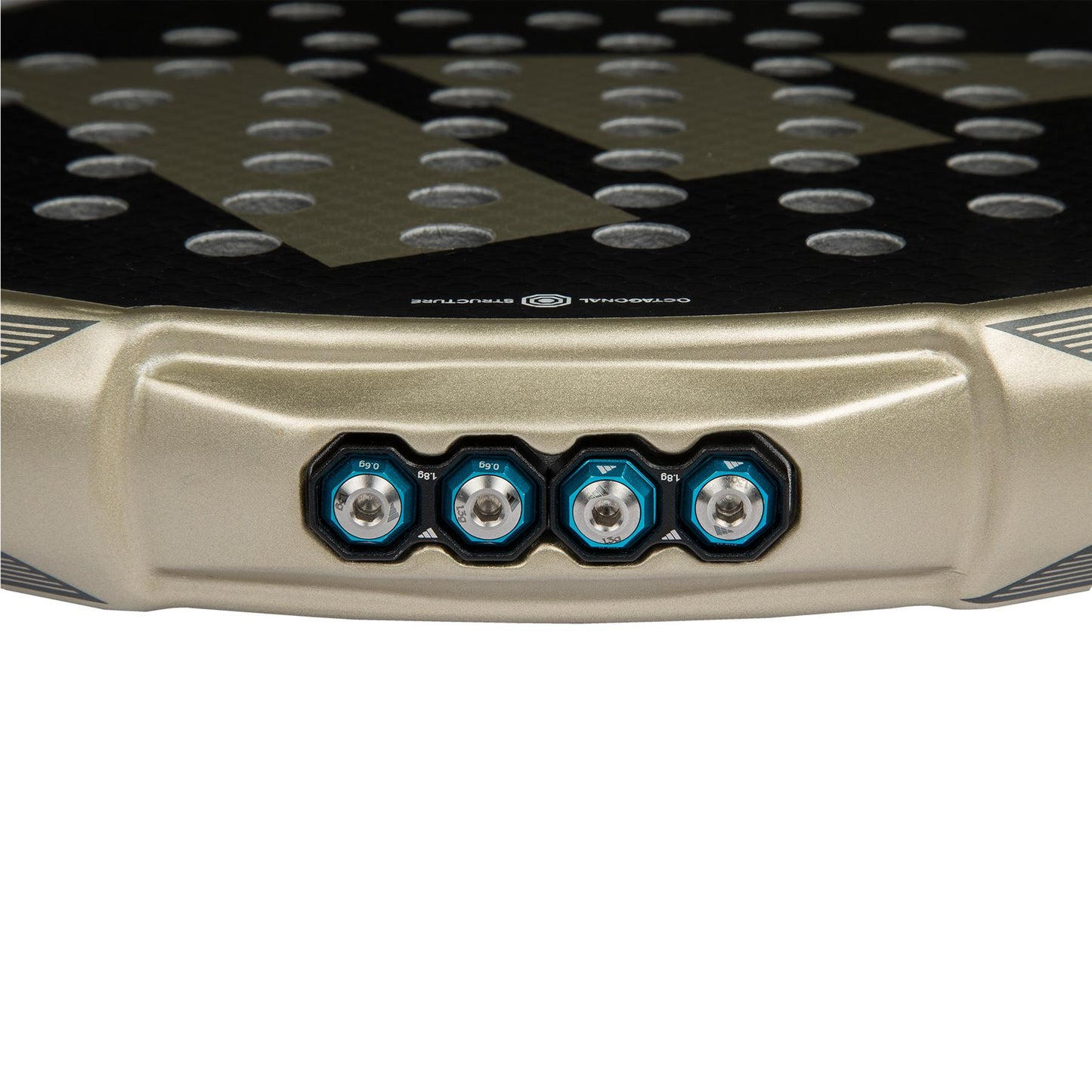 The close-up of the ADIDAS Metalbone CTRL 3.4 Padel Racket - Gold by adidas features four circular adjustment screws with blue rims on its edge. Its black surface and gold frame, peppered with small holes, are enhanced by an innovative Weight and Balance System for precision control.