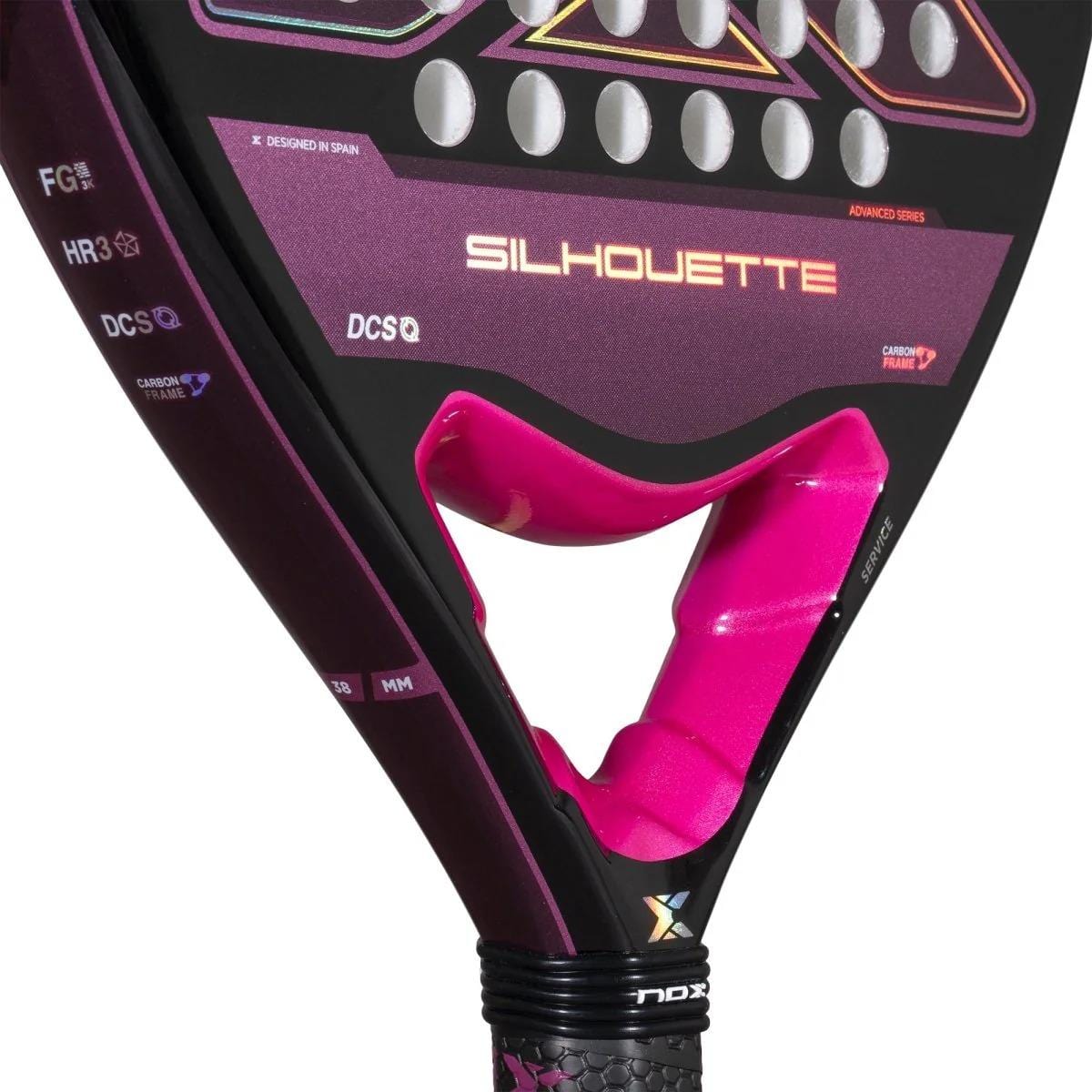 Close-up of the NOX X-One Silhouette Advance Series Padel Racket in black and pink, featuring geometric patterns, textured grip, HR3 core, Fibre Glass 3K surface, and technical specs from brand NOX.