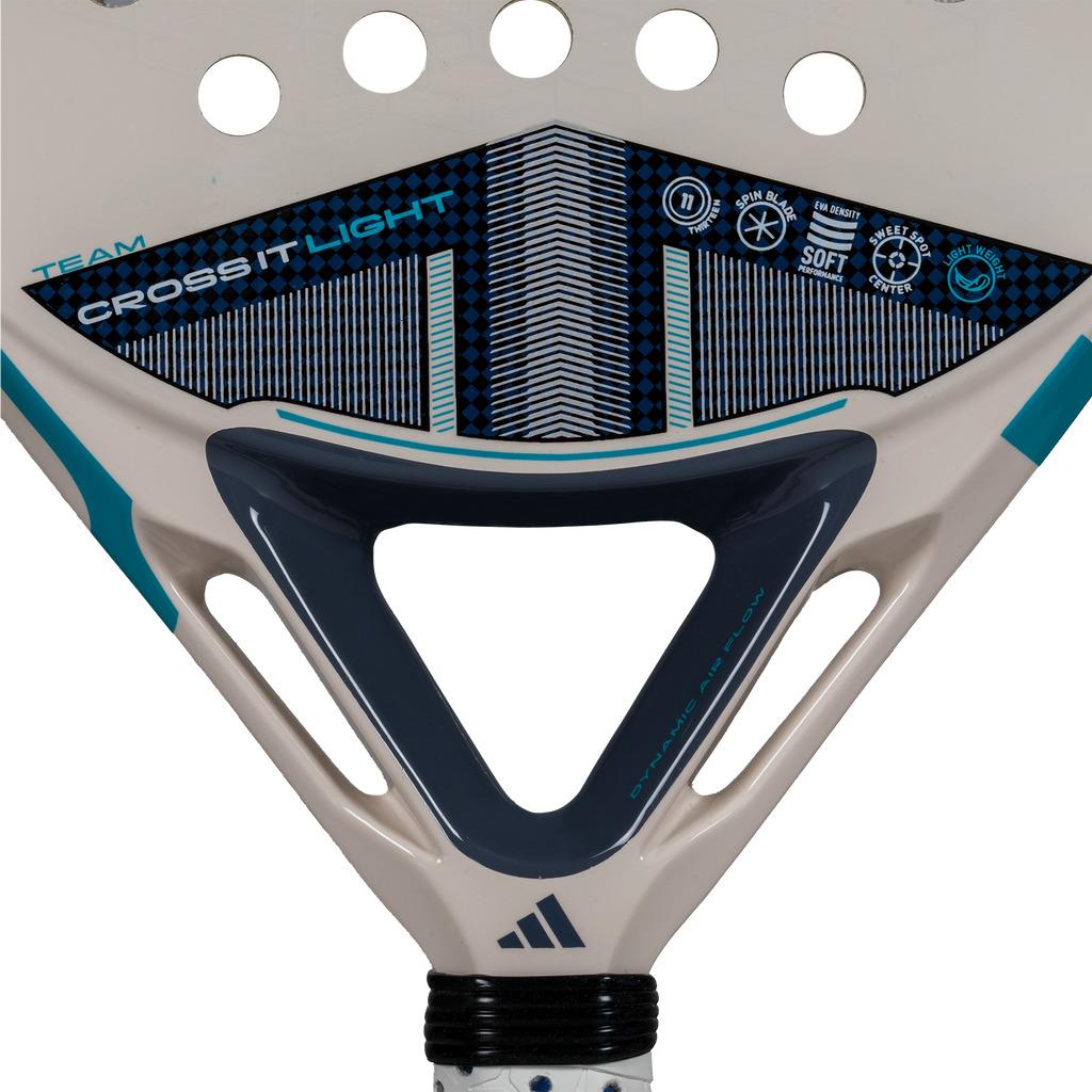 Close-up of the adidas Cross It Team Light 3.4 Padel Racket in white, designed for advanced players with geometric patterns, technical icons, bold branding, and adidas logo—perfect for aggressive gameplay.