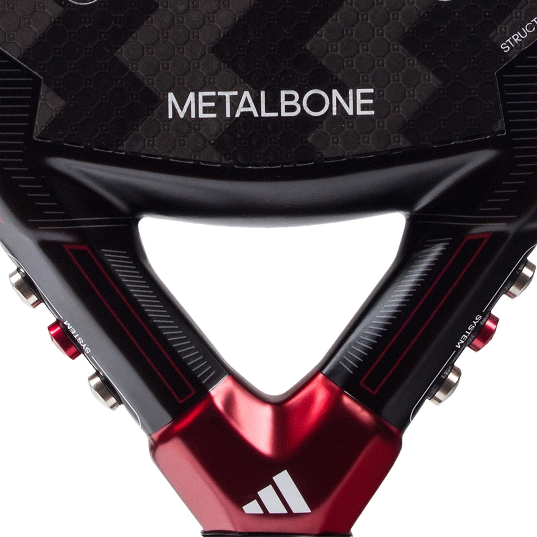 Close-up of the adidas Metalbone 3.3 Padel Racket - Black / Red, highlighting the carbon fiber texture at the bottom with red and silver accents. Designed for advanced players seeking enhanced power, it prominently features "METALBONE" in bold white letters and the iconic logo with three diagonal bars.