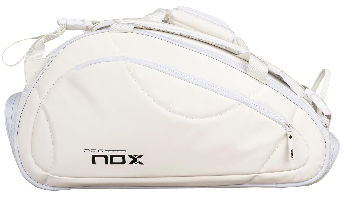 The NOX Pro Series Padel Racket Bag - White features a sleek, curved design, NOX ThermoTech, multiple zippered compartments, sturdy handles, and a 45L capacity for convenient carrying.
