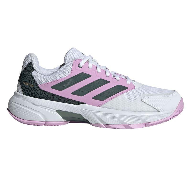 The ADIDAS CourtJam Control 3 Women's All Court Shoes in Bronze Strata, Legend Ink, and Bliss Lilac blend a modern bronze hue with blissful lilac accents and a distinct textured heel. Crafted from recycled materials, they showcase three stripes on the side in legend ink, feature a Bounce midsole for enhanced comfort, and are completed with a lilac sole for a sleek and modern design.