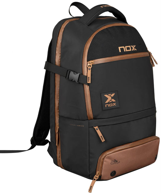 The NOX Luxury Open Series Padel Backpack - Black / Brown features multiple zippered compartments, a top handle, adjustable shoulder straps, air ventilation system, and prominent NOX branding on the front.