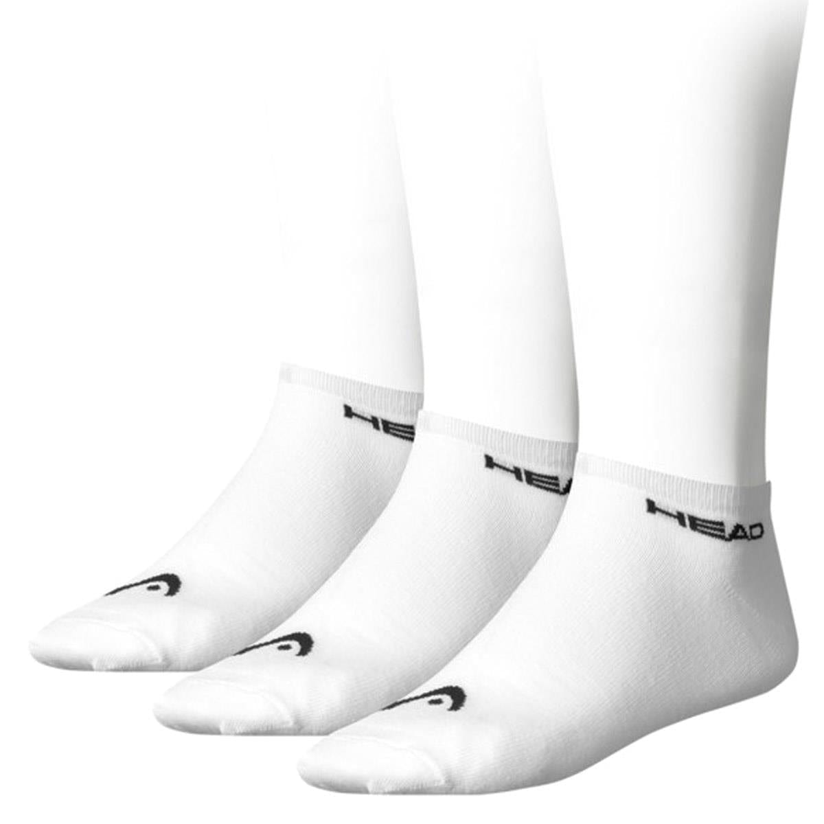 The HEAD Sneaker Padel Socks (3 Pack) in White/Black are crafted from a soft cotton blend for comfort. They feature a black logo on the toes and "HEAD" branding on the ankle, displayed on mannequin feet against a white backdrop.