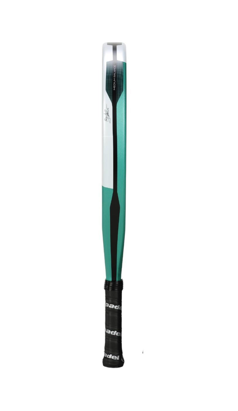 The Bullpadel Hack Junior 25 Padel Racket in teal and white, designed for advanced junior players, features a Carbon Tube frame with a black and white taped handle. Its distinctive diamond head shape stands out against a plain white background.