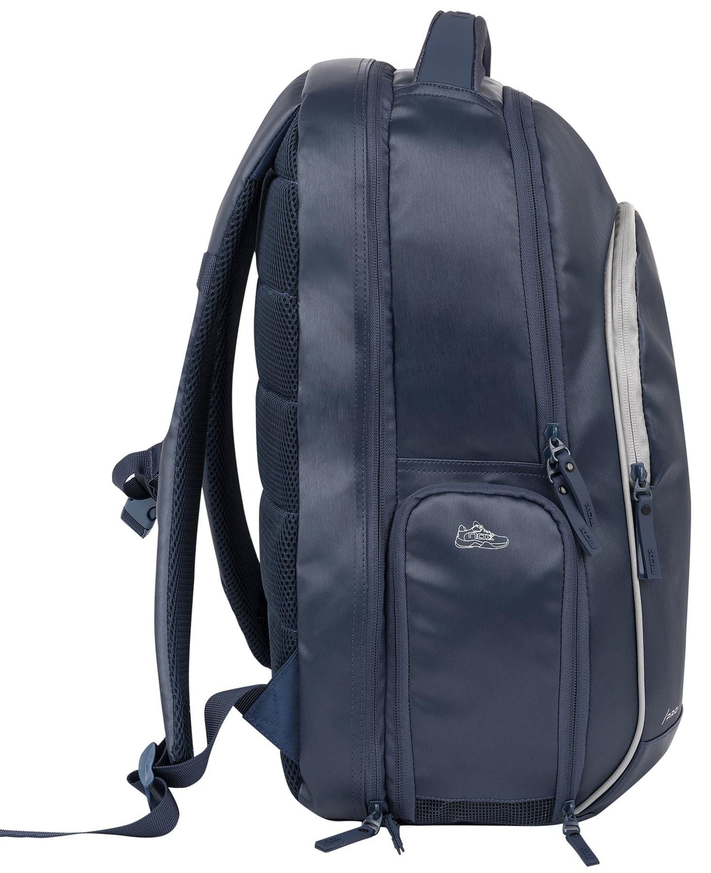 The NOX Pro Series Padel Backpack - Blue by NOX features padded shoulder straps, air ventilation, multiple zippered compartments, and a small embroidered logo on the side, shown in side profile against a white background.