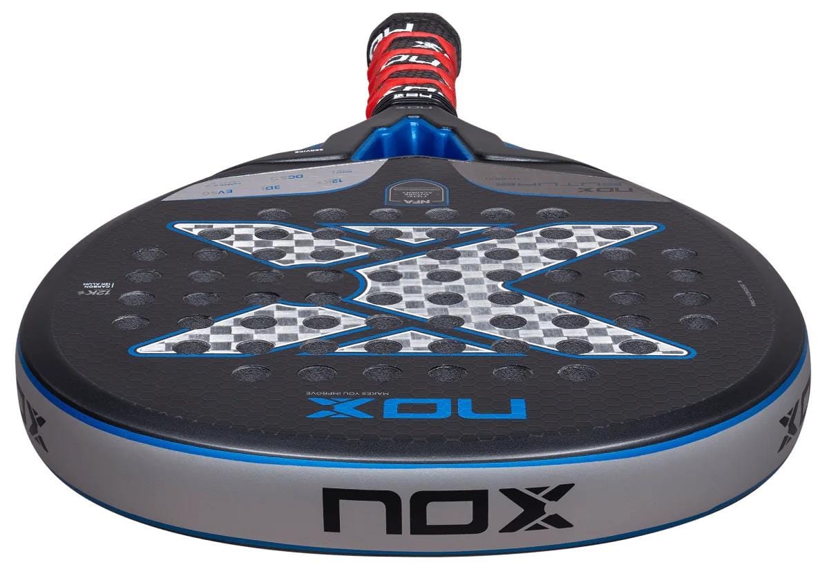 Close-up of the NOX NFA Future Hybrid 12K Alum Padel Racket in black and blue, showcasing its large "X" design, textured holes, NOX branding on the edge and handle.