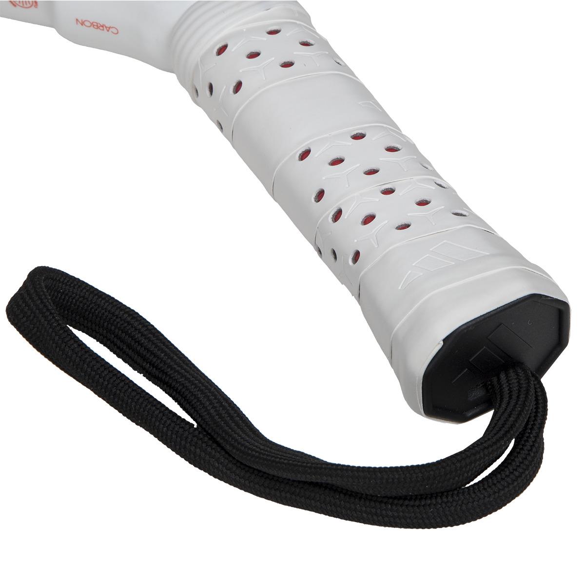 Close-up of a white racket handle with a black strap attached. Designed for advanced players, it features a perforated grip, offering precision and performance akin to the adidas Metalbone Carbon 3.4 Padel Racket in Black/White.