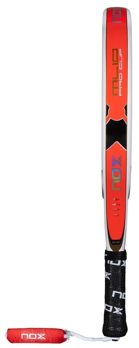 The NOX ML10 Pro Cup Coorp By Miguel Lamperti 2025 Padel Racket by NOX is featured standing vertically, with a black grip handle and a red wrist strap, showcasing its red and black design inspired by professional player Miguel Lamperti.