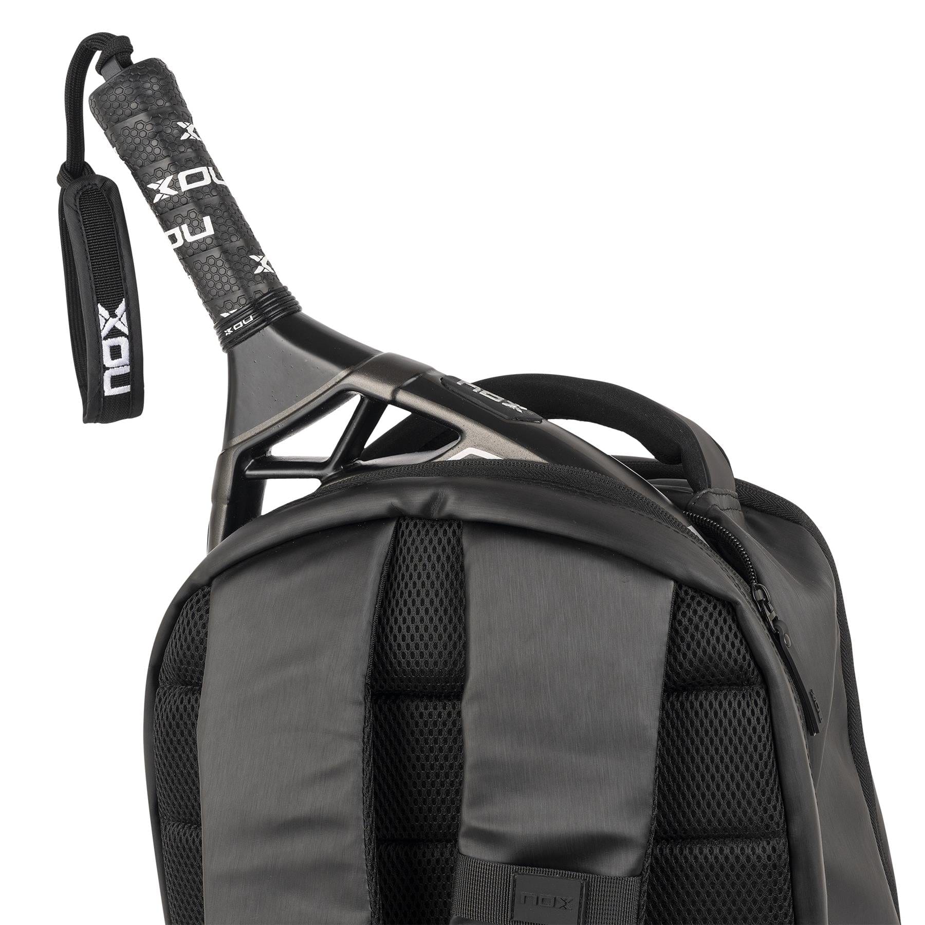 A close-up of the NOX Pro Series Padel Backpack - Black, featuring padded straps, mesh backing, and spacious storage, with a black grip padel racket partially inside.