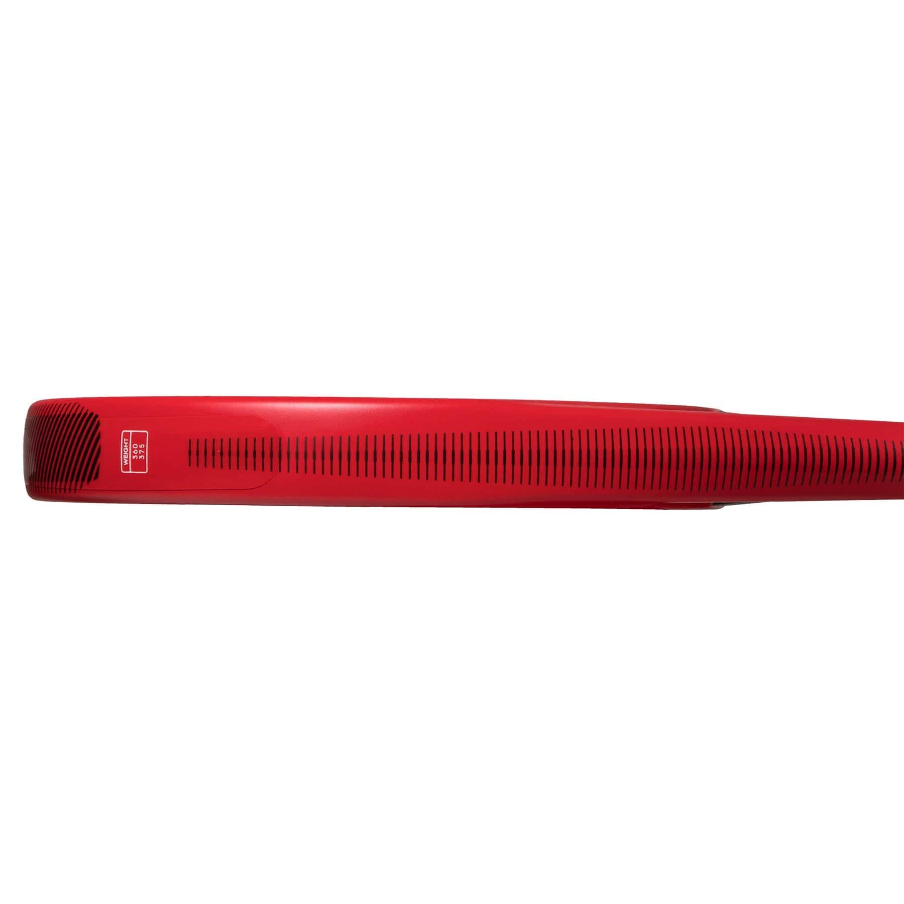 A red electric guitar body, echoing the sleek design and advanced craftsmanship of the ADIDAS RX Series Padel Racket in red by adidas, is displayed from the side. Its vent-like slots enhance sound resonance while the vibrant color creates a striking contrast against the plain white background.