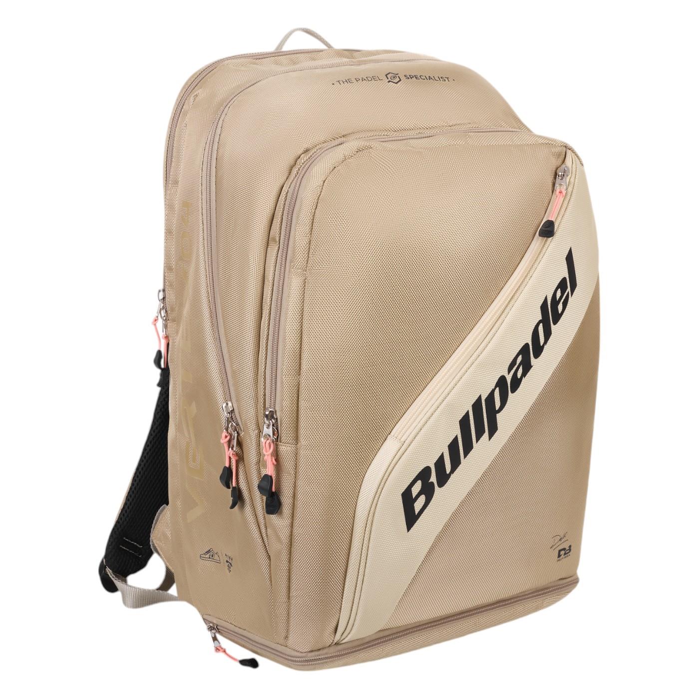 The Bullpadel Vertex 25 Padel Backpack in stone features multiple compartments, black zippers, and a reinforced thermo-lined section. The brand name is prominently displayed diagonally across the front in black letters, making it perfect for stylishly carrying your Vertex Padel Racket and essentials.
