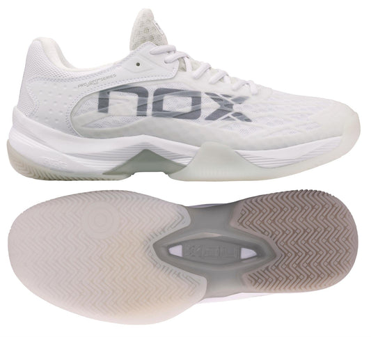 The NOX AT10 Lux Mens Padel Shoes in White/Grey are shown from side and bottom views, featuring "NOX" branding, a textured sole, and a mesh upper—designed for peak performance inspired by Agustin Tapia.