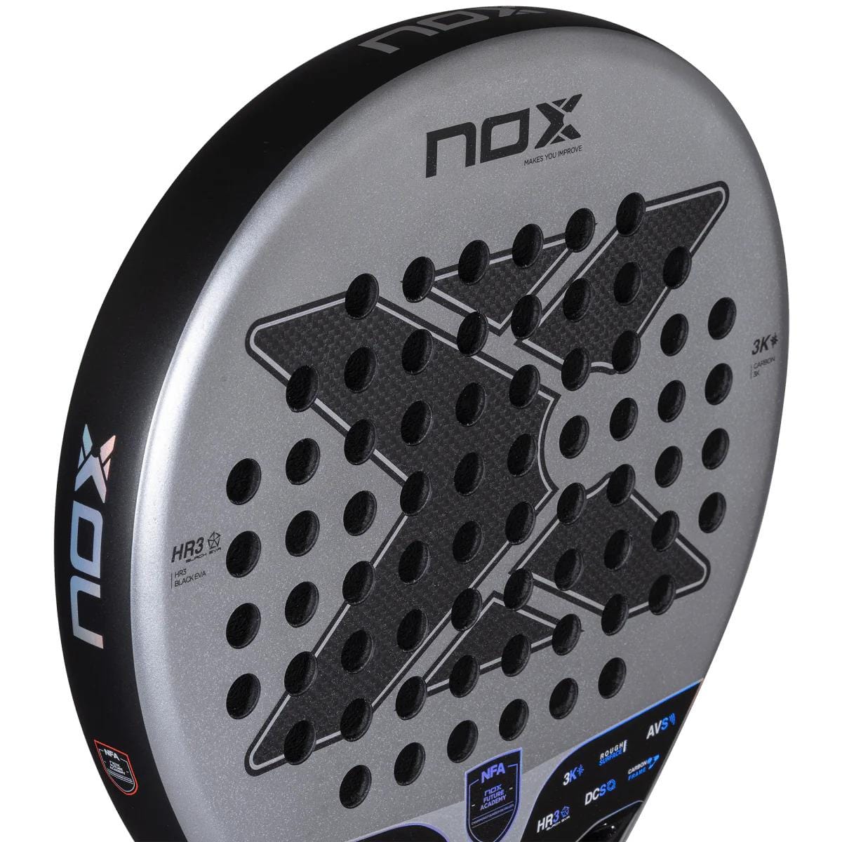 Close-up of the NOX NFA Nextgen Pro Hybrid 3K Padel Racket in silver and black, featuring a large X pattern and multiple holes on the paddle’s surface.