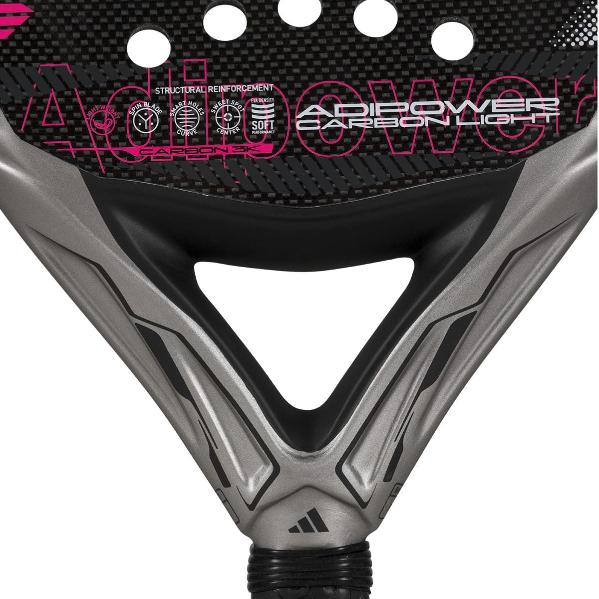 The ADIDAS Adipower Carbon Light 3.4 Padel Racket in silver and pink features a sleek design with Carbon 3K Fibre texture. "Adipower" branding stands out in bold pink, highlighting structural reinforcement, a 3D Spin Blade Mold, and a gracefully positioned handle at the bottom.
