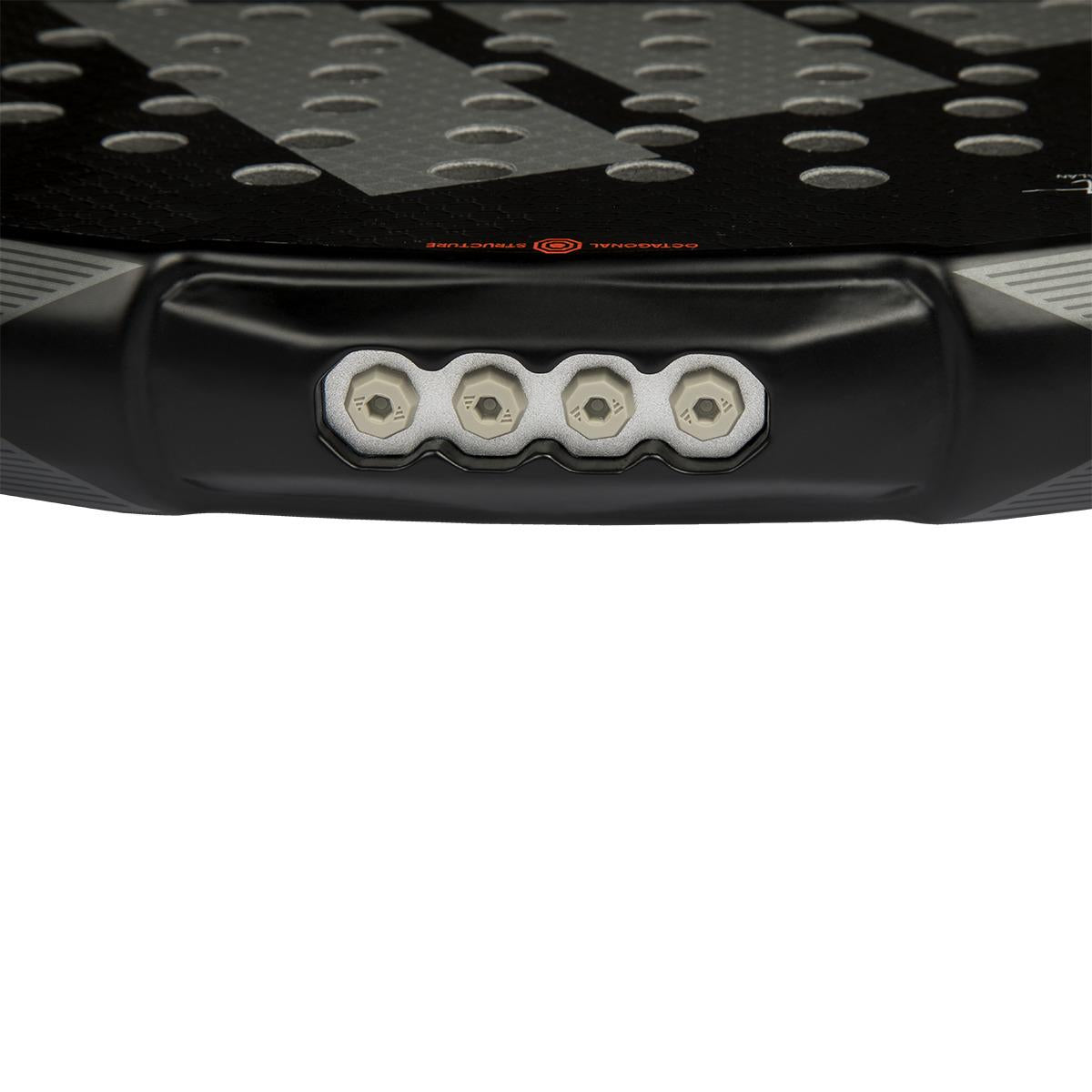 Close-up of the adidas Metalbone 3.4 Padel Racket in Black/White for advanced players, showcasing its robust frame and metallic round components. The surface features a textured pattern with precise circular holes.