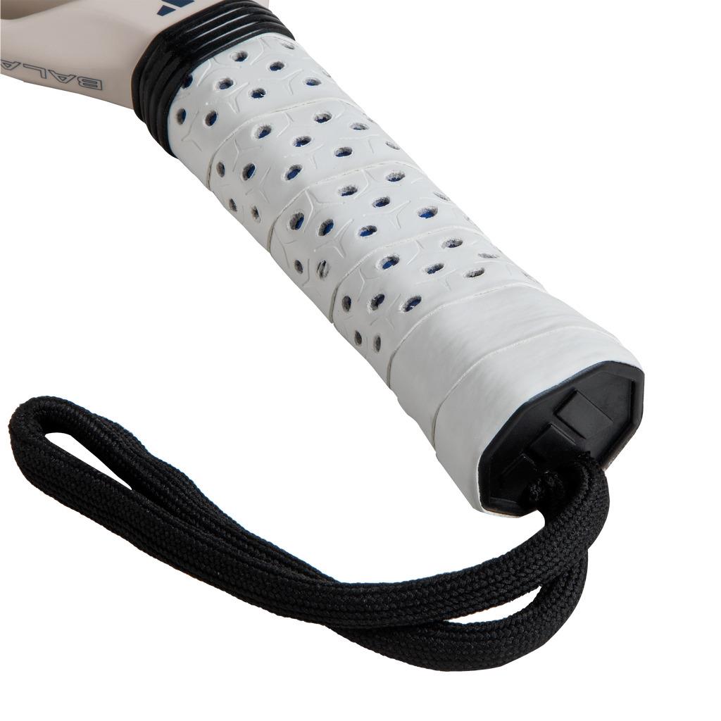 Close-up of the adidas Cross It Team Light 3.4 Padel Racket - White, featuring a perforated white grip with a black wrist strap, designed for advanced-level players.