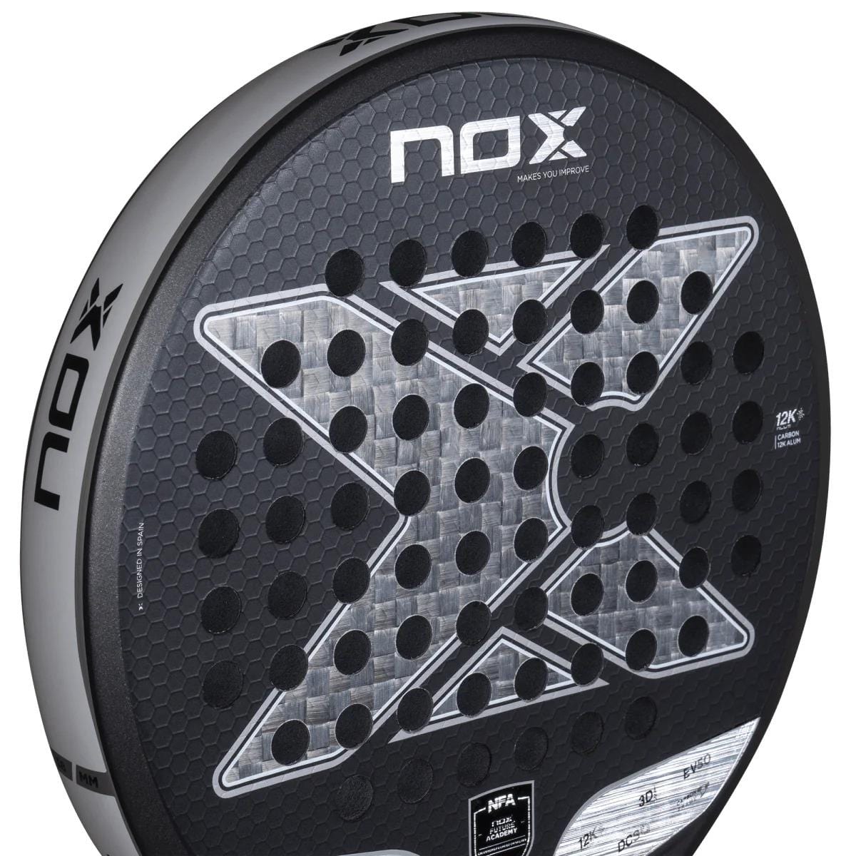 Close-up of the NOX NFA Future Control 12K Alum Padel Racket in black/white, featuring a large X design, hexagonal pattern, and circular holes—crafted for players seeking precise control.
