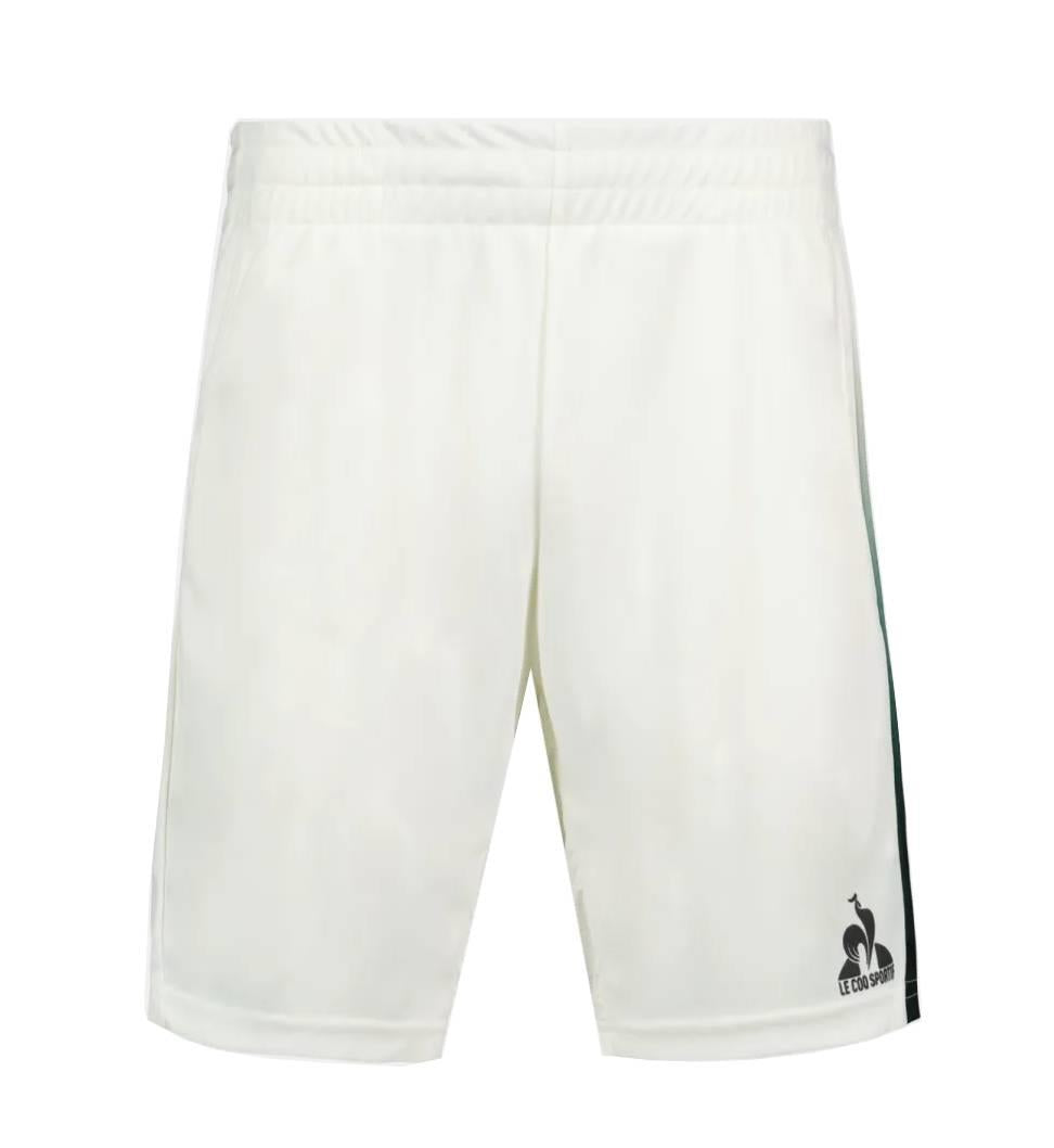 Le Coq Sportif Pro Mens Padel Shorts in Marshmallow feature an elastic waistband, breathable fabric, a small black logo on the left leg, and a dark green stripe down the right side. Shown against a plain white background.