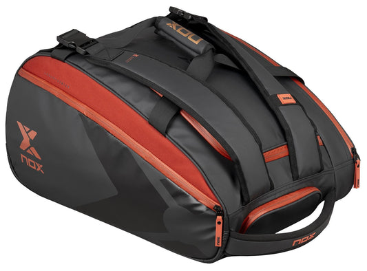 The NOX Luxury Open Series Padel Racket Bag in black/red features "NOX" branding, two shoulder straps, a handle, multiple zippered compartments, and ThermoTech technology for enhanced gear protection.