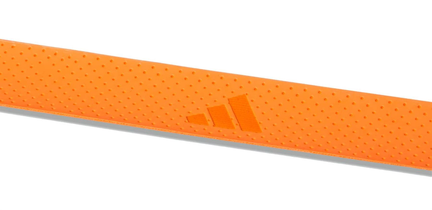 Close-up of an orange ADIDAS Padel Overgrips (3 Pack) by adidas, featuring a textured, micro-perforated surface and embossed adidas logo for enhanced comfort and performance.