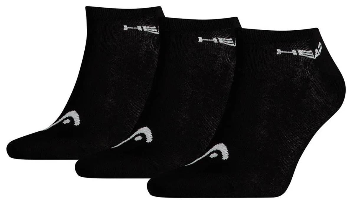 A row of three black HEAD Sneaker Padel Socks showcases white branding on the cuff and a geometric toe pattern, highlighting their comfort-focused design against a white background.