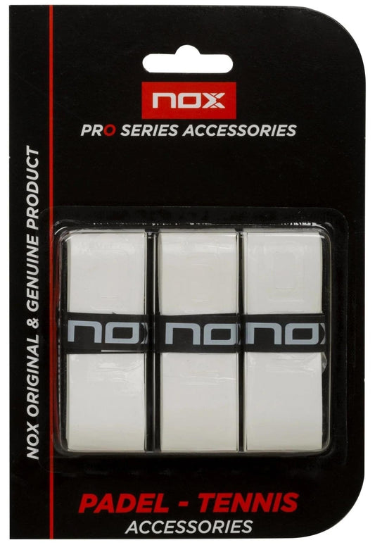 The NOX Pro Padel Overgrips - White (3 Pack) come in a black and red retail package labeled "PRO SERIES ACCESSORIES" and "PADEL - TENNIS ACCESSORIES," designed for padel or tennis rackets to enhance breathability and comfort.