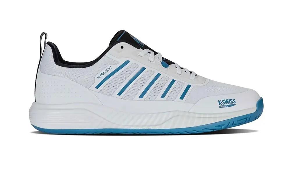 The K-Swiss Ultra Court Men's Padel Shoes in White/Black/Blue Moon are perfect for padel enthusiasts, featuring breathable mesh, blue accents, a blue sole, multiple stripes, and a pull tab on the heel to offer drag protection during intense matches.