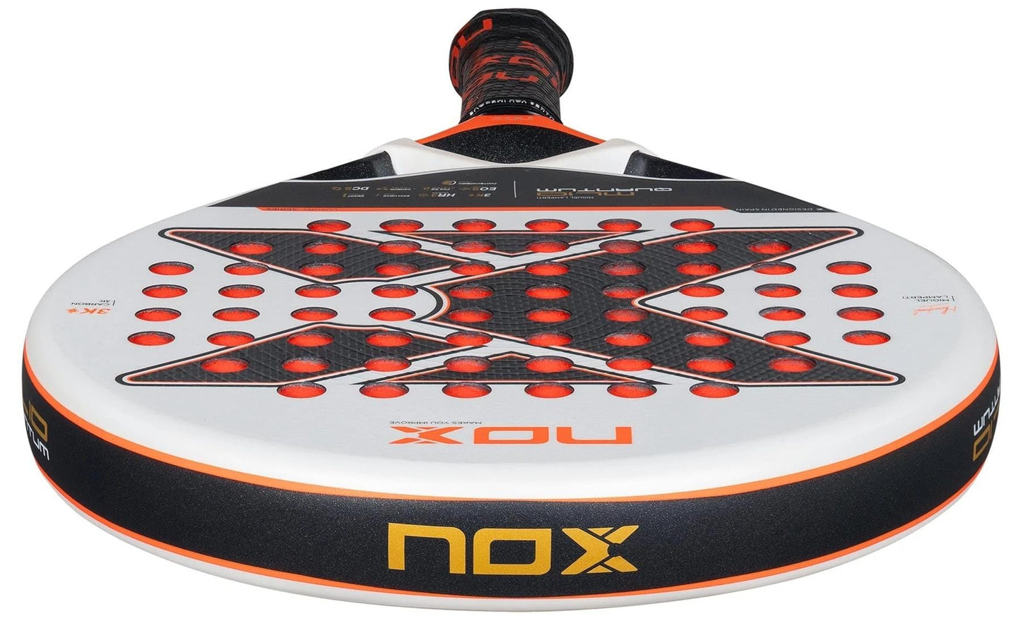 A close-up of the NOX ML10 Luxury Quantum 3K By Miguel Lamperti 2025 Padel Racket shows its black, white, and orange colors, bold X design, red circular holes, and advanced NOX HR3 rubber for top performance.
