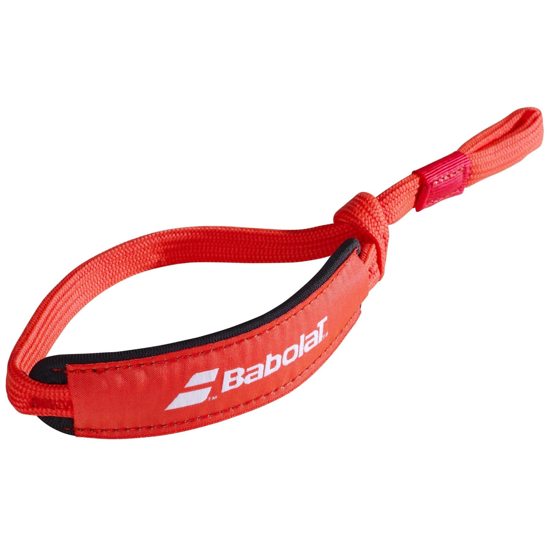 The Babolat Padel Wrist Strap in red is an ideal match for your Babolat rackets. It showcases the classic white Babolat logo and includes a looped end with an adjustable closure, offering a removable wrist strap for enhanced grip and security while playing.
