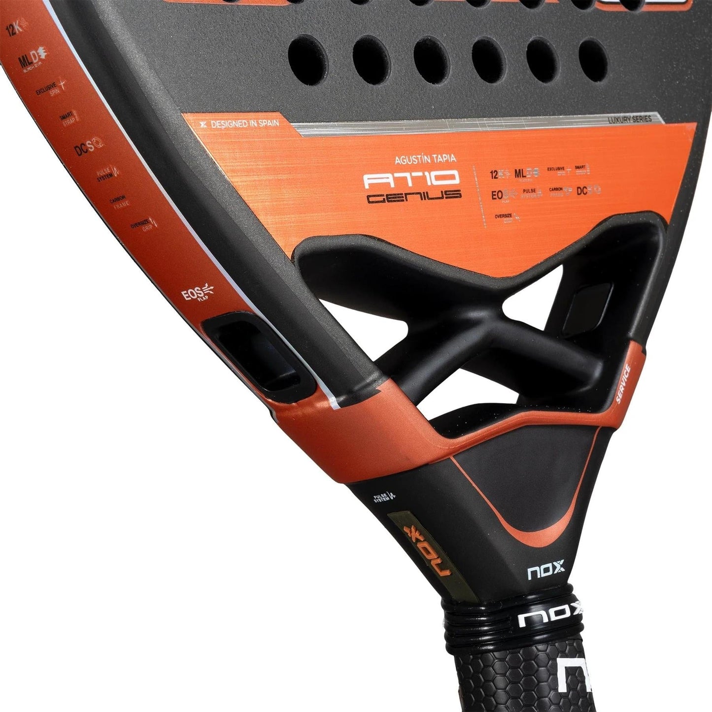 Close-up of the NOX AT10 Luxury Genius Attack 12K By Agustin Tapia 2025 padel racket base and throat, showing 12K carbon fibre construction, NOX branding, specifications, and textured grip handle.
