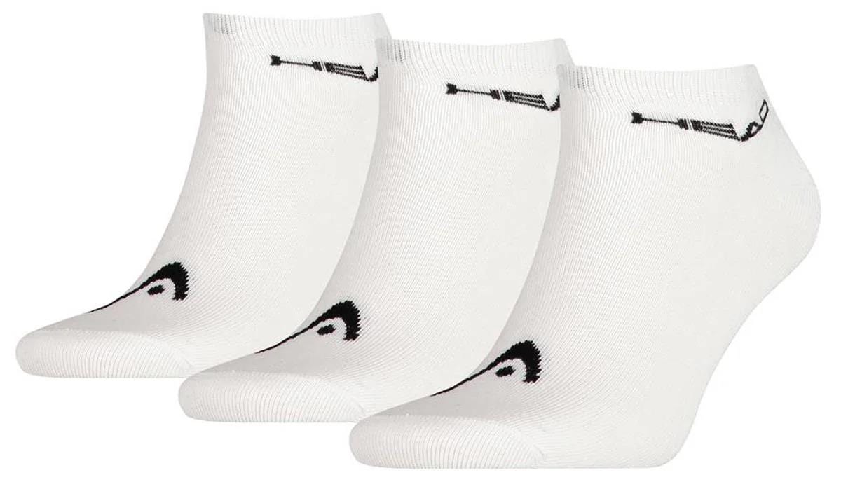 The HEAD Sneaker Padel Socks (3 Pack) in white/black are crafted from a soft cotton blend for ultimate comfort. They feature a small black HEAD logo near the top and chic black detailing near the toes, showcased side by side on a pristine white background.