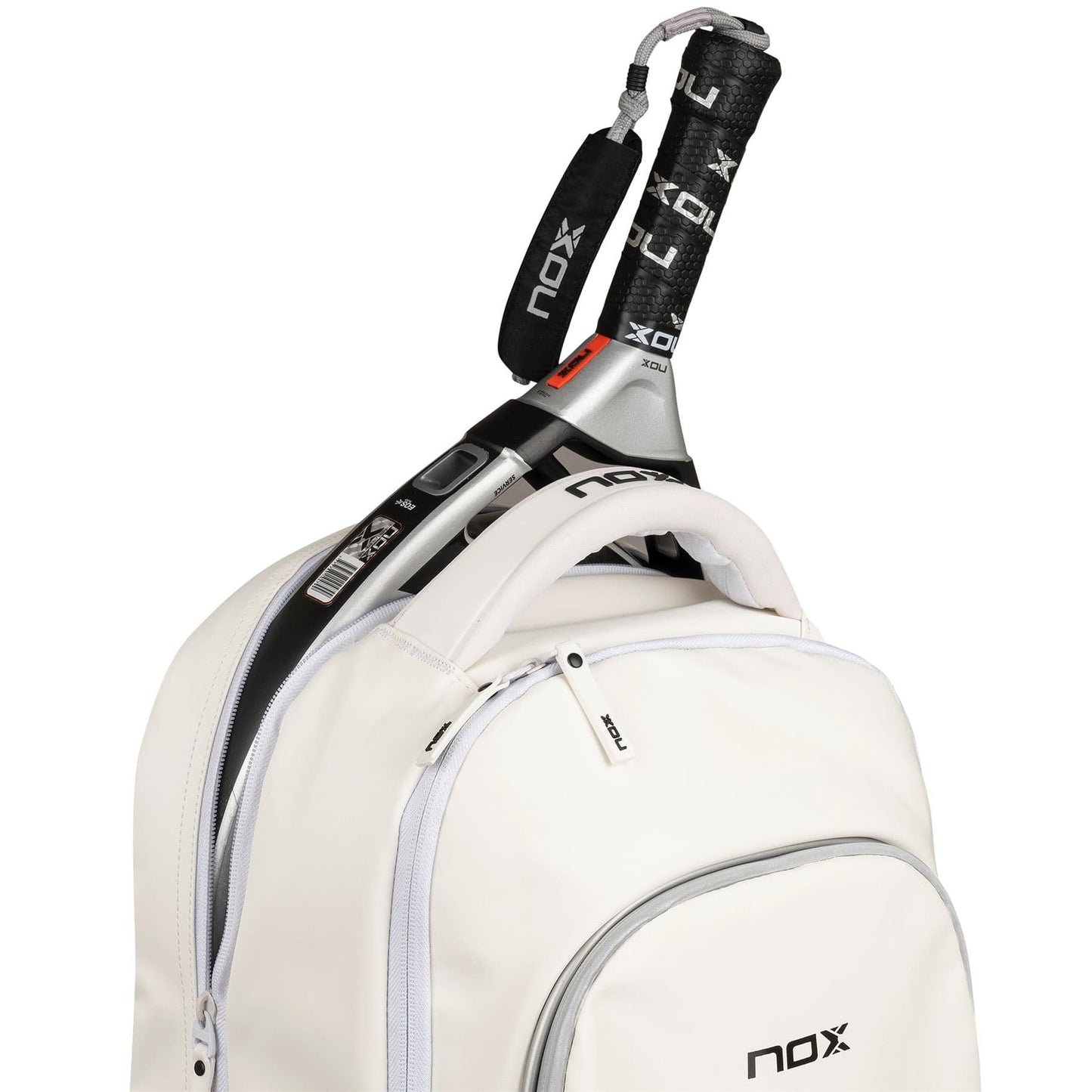 A close-up of the NOX Pro Series Padel Backpack - White by NOX shows its curved seams, front pocket with NOX logo, and a partially open zipper revealing a padel racket handle inside the main compartment.
