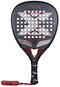The NOX NFA Future Attack 12K Alum Padel Racket in black/red features a Carbon 12K perforated surface, large “X” design, branded black grip, and red wrist strap—engineered for power by NOX.