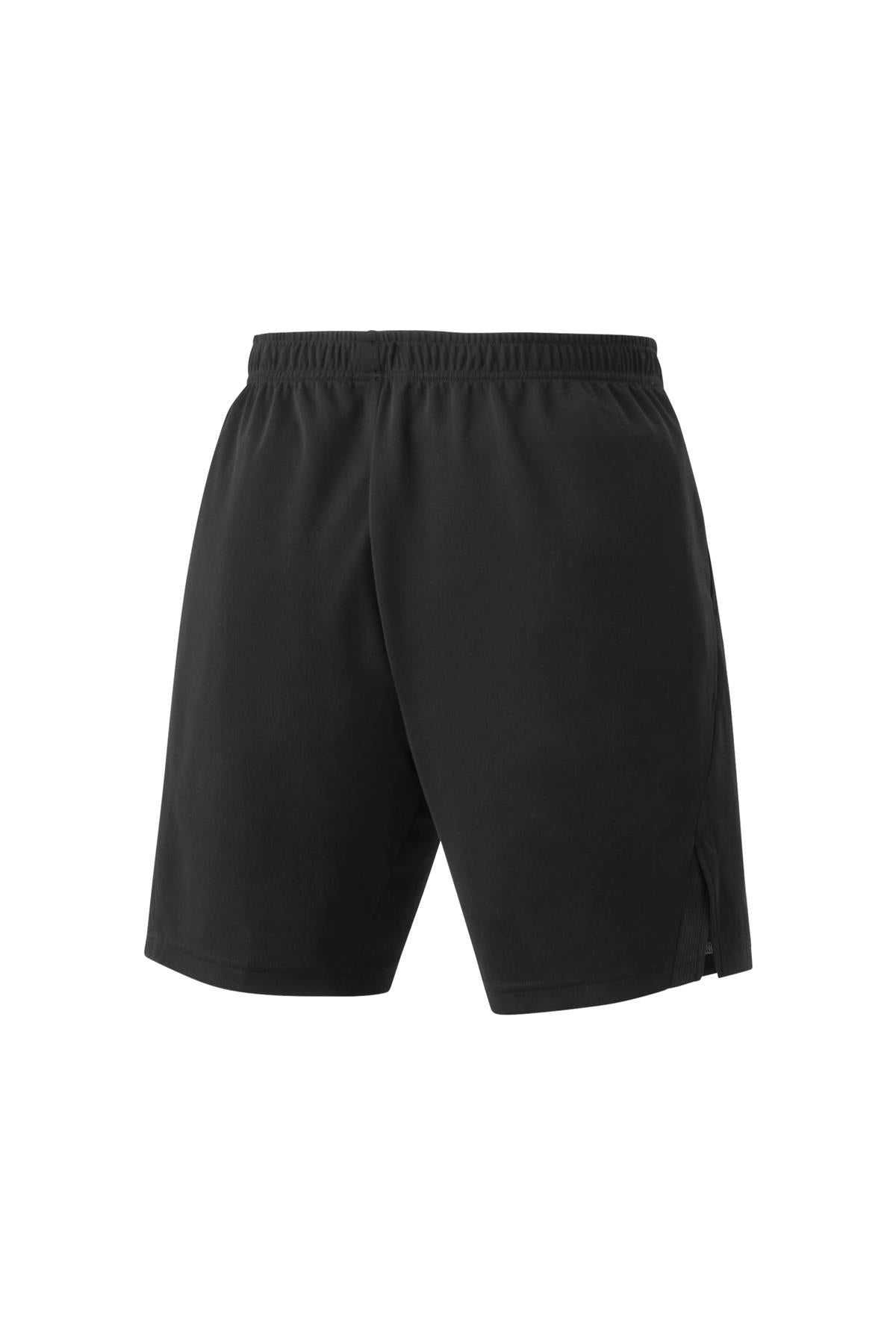 The Yonex 15170 Knit Men's Padel Shorts, shown from the back in black, feature an elastic waistband and VeryCool Dry technology. These shorts provide a simple and sleek design suitable for sports or casual wear, along with UV reduction.