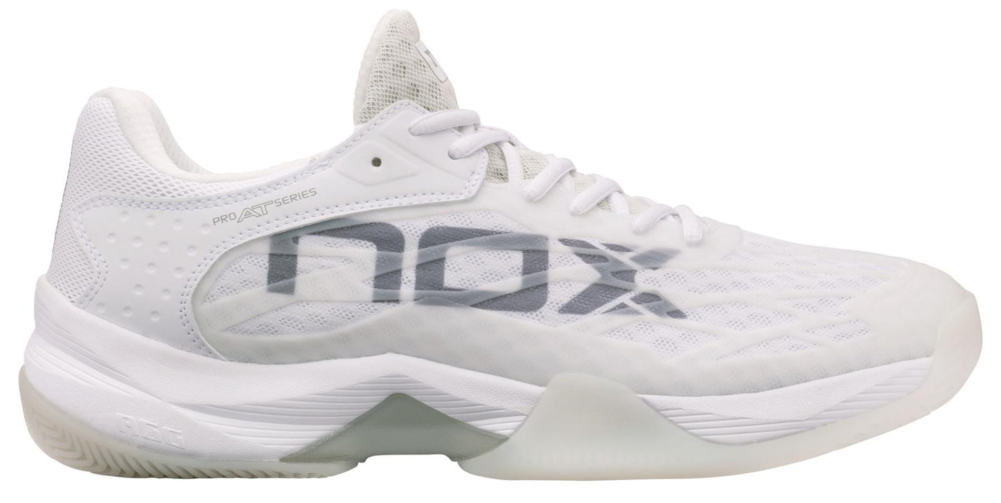 The NOX AT10 Lux Men's Padel Shoes in White/Grey feature a breathable mesh upper, cushioned sole, and lace-up closure. Worn by Agustin Tapia, they're renowned as the best power padel shoes from NOX.