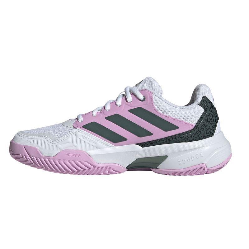 The adidas CourtJam Control 3 women's all court shoes in Bronze Strata / Legend Ink / Bliss Lilac feature a mesh upper complemented by a textured heel and vibrant detailing. Designed for athletic use, they include a thick Bounce midsole made from recycled materials to provide both comfort and sustainability.