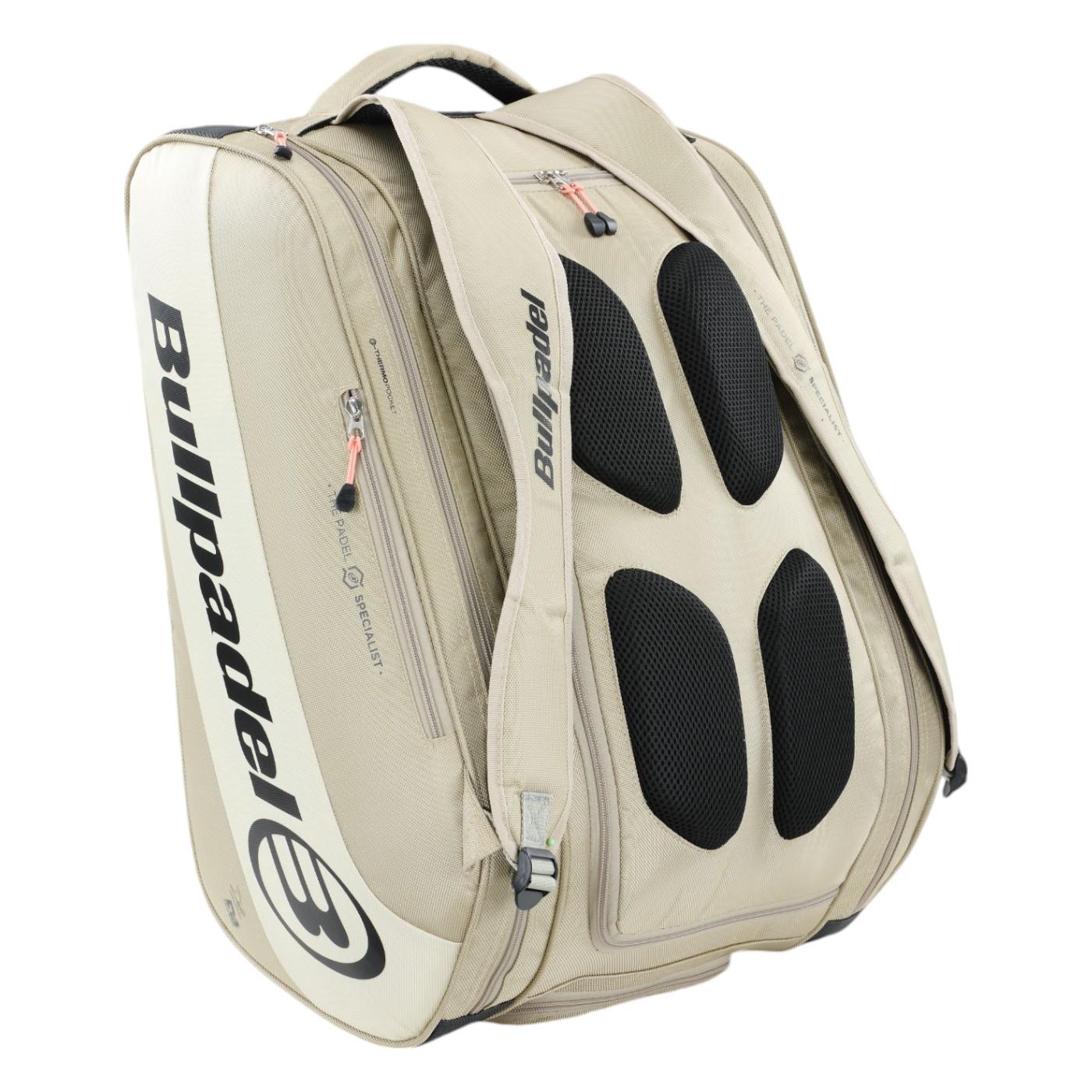 The Bullpadel Vertex 25 Padel Racket Bag in stone features black mesh ventilation, a sleek logo, padded straps, reinforced thermo-lined compartments, and multiple pockets for effortless sports gear transport.