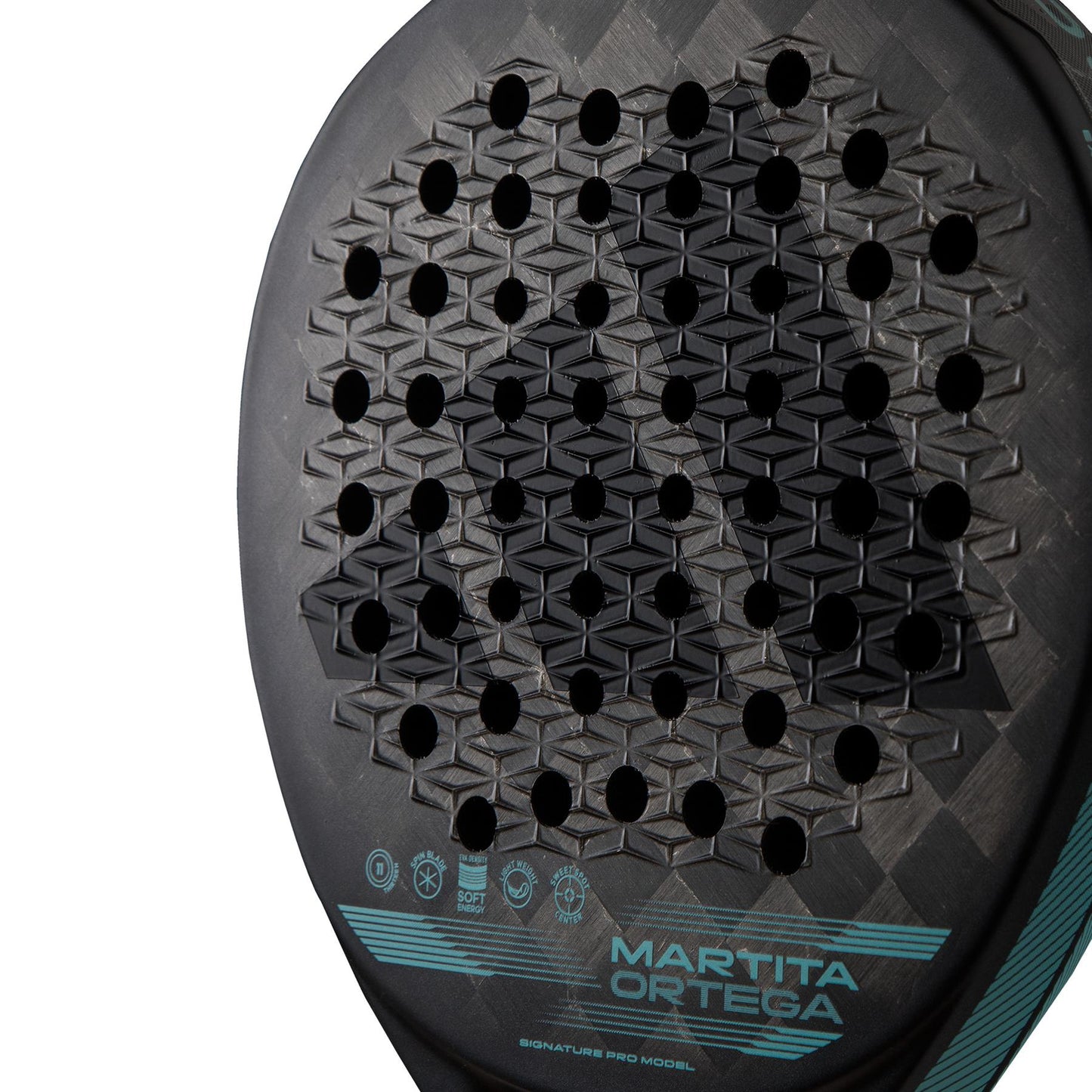 Close-up of an ADIDAS Cross It Light Padel Racket in black, showcasing hexagonal perforations and a textured pattern designed for lightweight control. The surface bears the words "MARTITA ORTEGA" and "SIGNATURE PRO MODEL," enhanced by graphic symbols and expertly crafted with Carbon Aluminized 24K.
