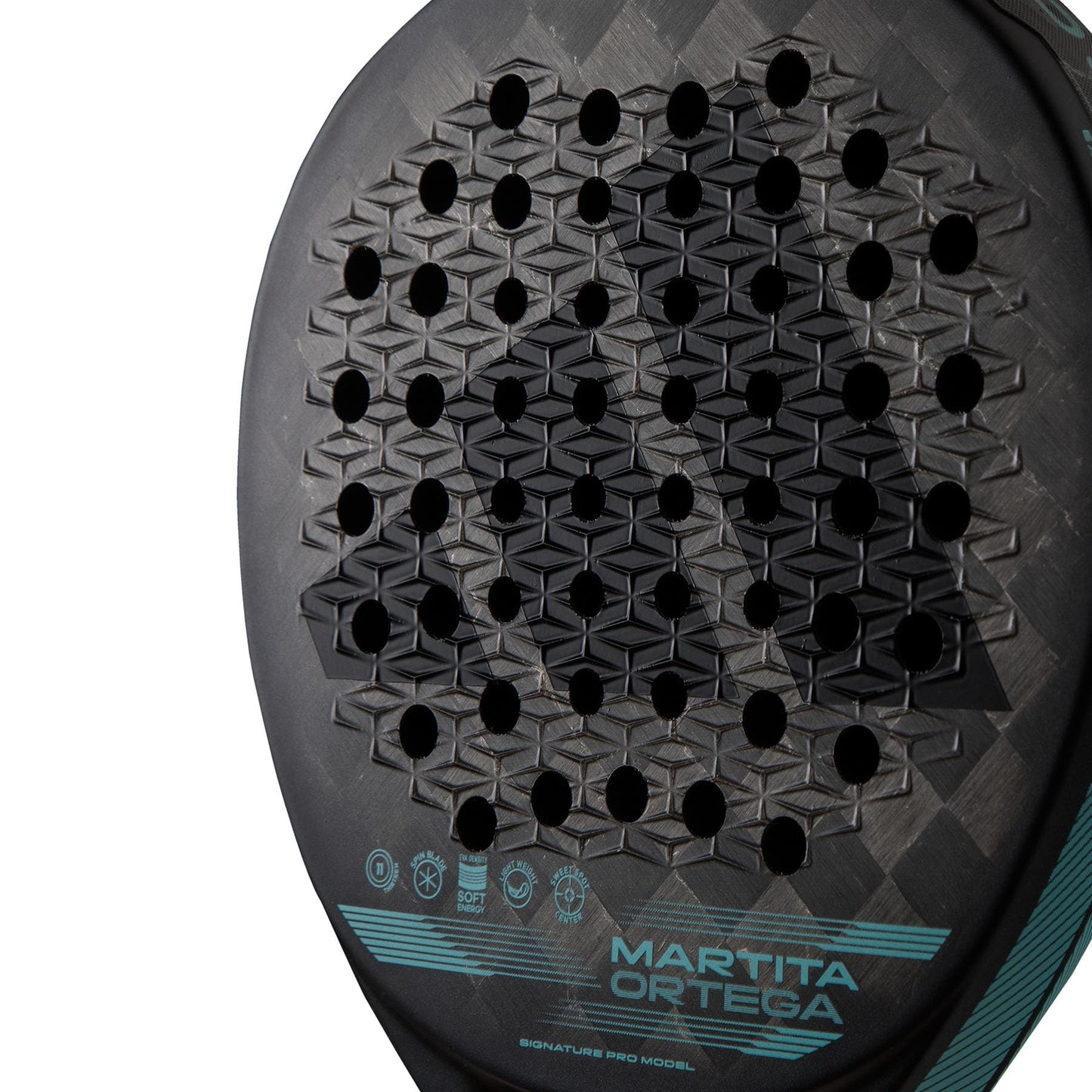 Close-up of an ADIDAS Cross It Light Padel Racket in black, showcasing hexagonal perforations and a textured pattern designed for lightweight control. The surface bears the words "MARTITA ORTEGA" and "SIGNATURE PRO MODEL," enhanced by graphic symbols and expertly crafted with Carbon Aluminized 24K.