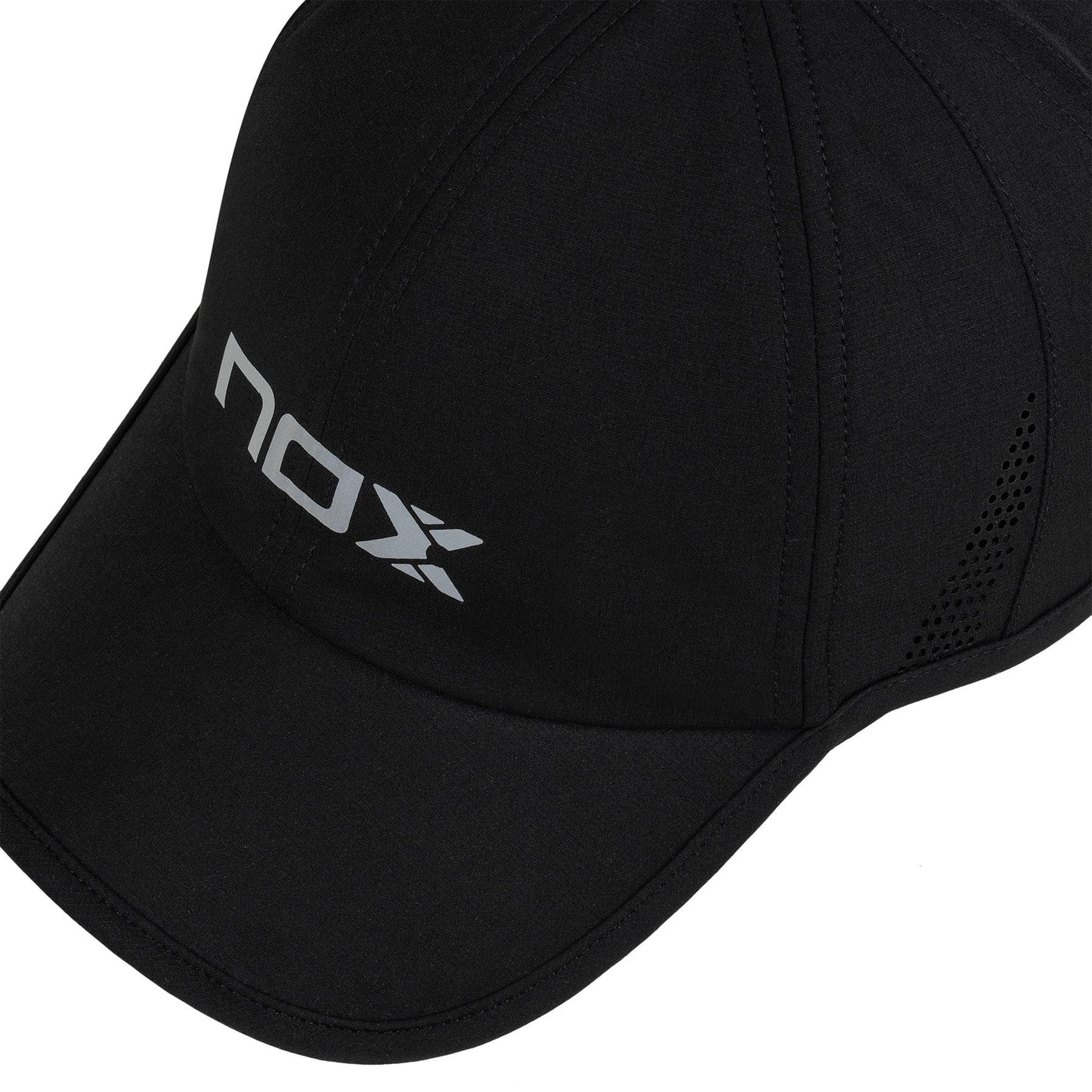 The NOX Padel Cap - Black / White by NOX features a white "NOX" logo on the front left, side ventilation holes, and an adjustable fit for sun protection.