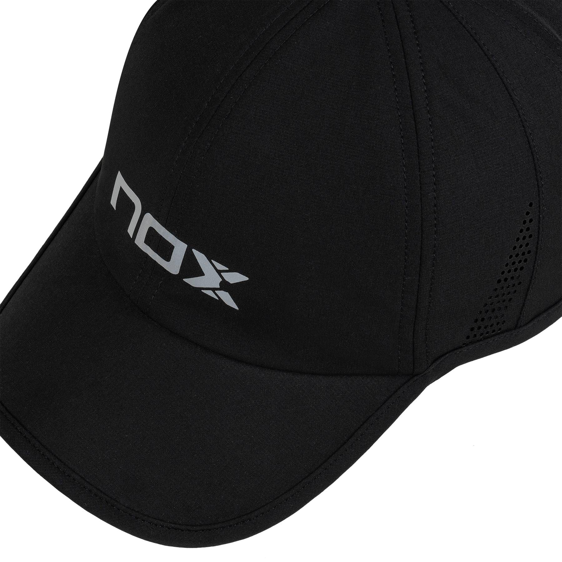The NOX Padel Cap - Black / White by NOX features a white "NOX" logo on the front left, side ventilation holes, and an adjustable fit for sun protection.