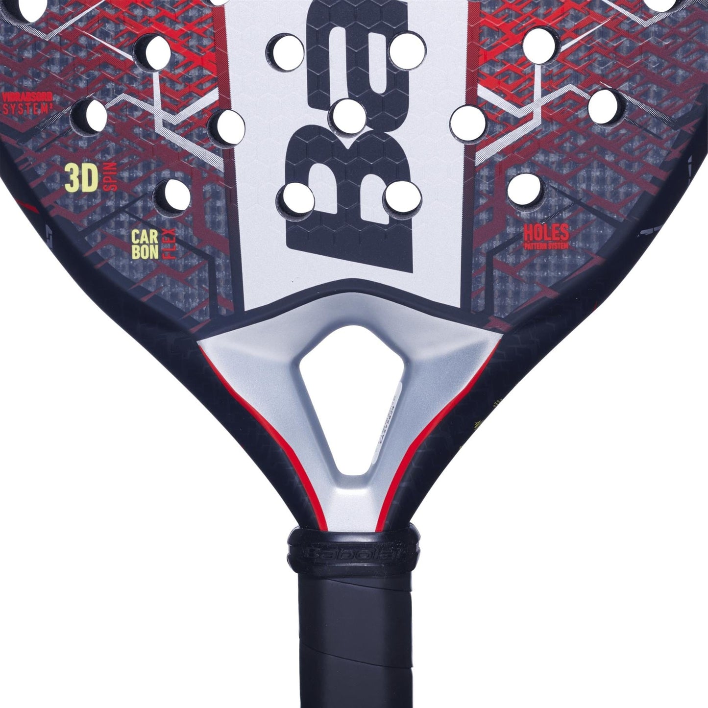 Close-up of the Babolat Technical Veron 2.5 Padel Racket in red, featuring a black and red honeycomb pattern, round holes, central Babolat logo, and visible Carbon Flex grip and handle at the bottom.