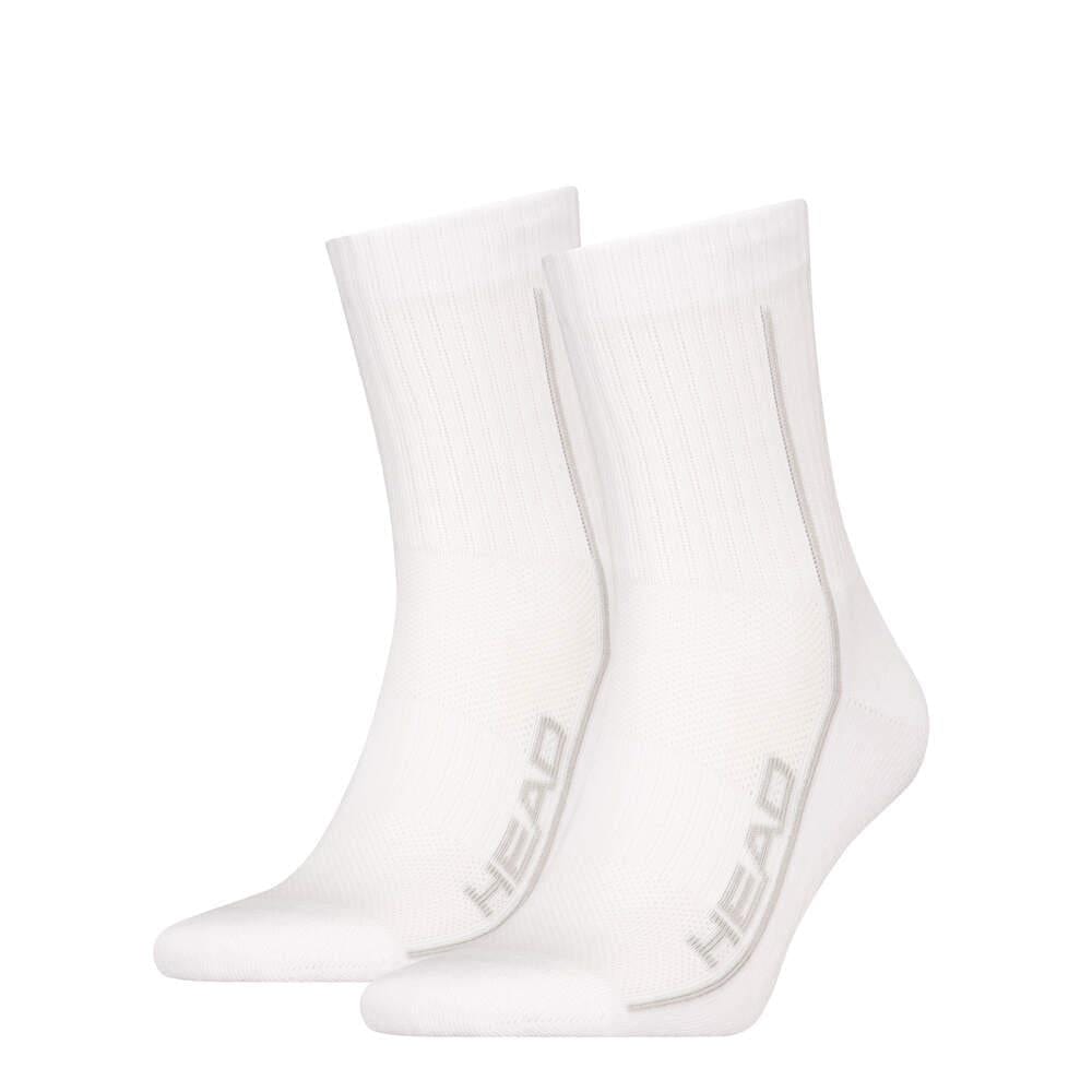 A pair of HEAD Performance Short Crew Padel Socks from the 2-pack in white has ribbed cuffs and a gray "HEAD" logo on the side, designed for comfort with shock absorption and arch support, and appears new.