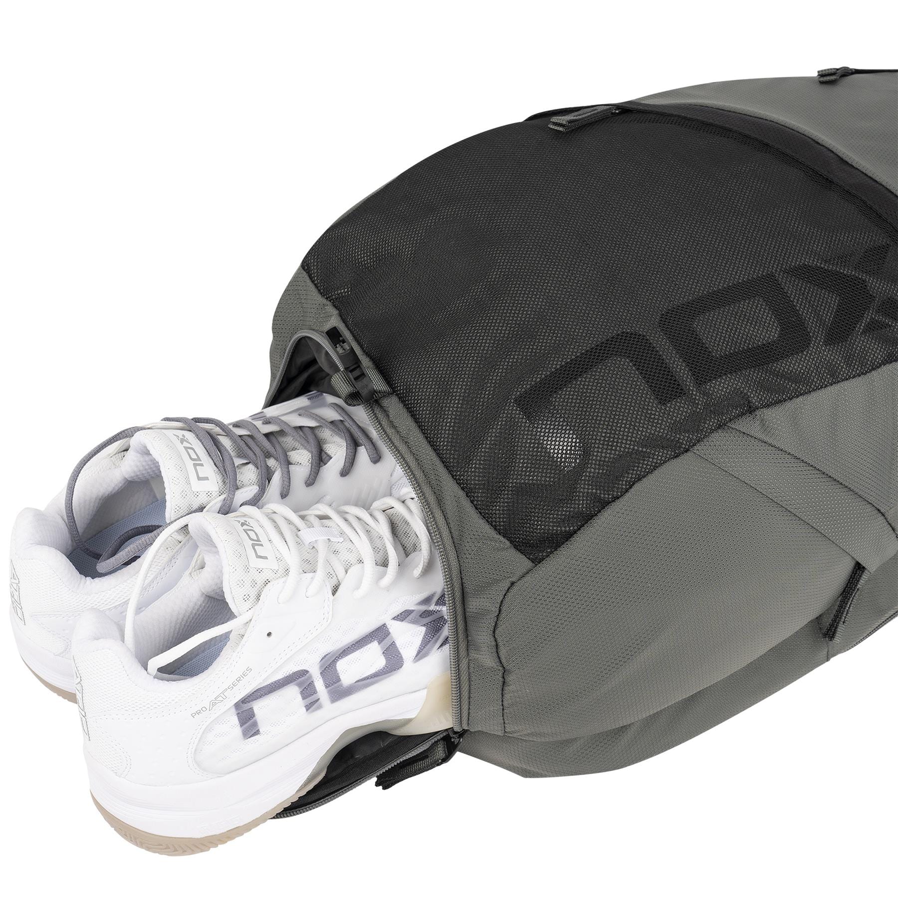 A pair of white NOX sneakers peeks from the NOX Street Series Padel Backpack - Grey, featuring ergonomic padded straps and a mesh zippered compartment. The visible NOX logo on both makes it ideal for your sports adventures.