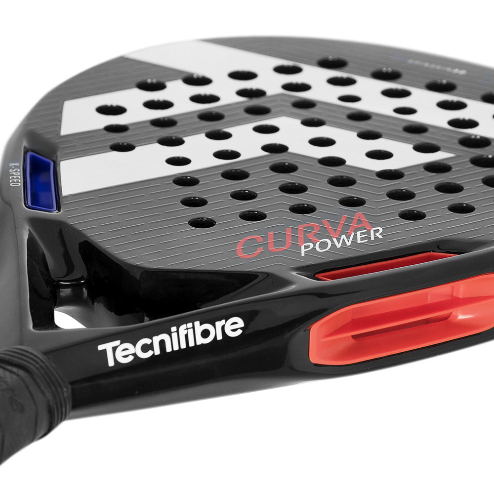 Close-up of a Tecnifibre Curva Power Padel Racket in black featuring an 18K carbon face. It has diagonal white stripes with a red and blue frame. "CURVA POWER" and "Tecnifibre" are prominently displayed, highlighting its refined craftsmanship and performance.