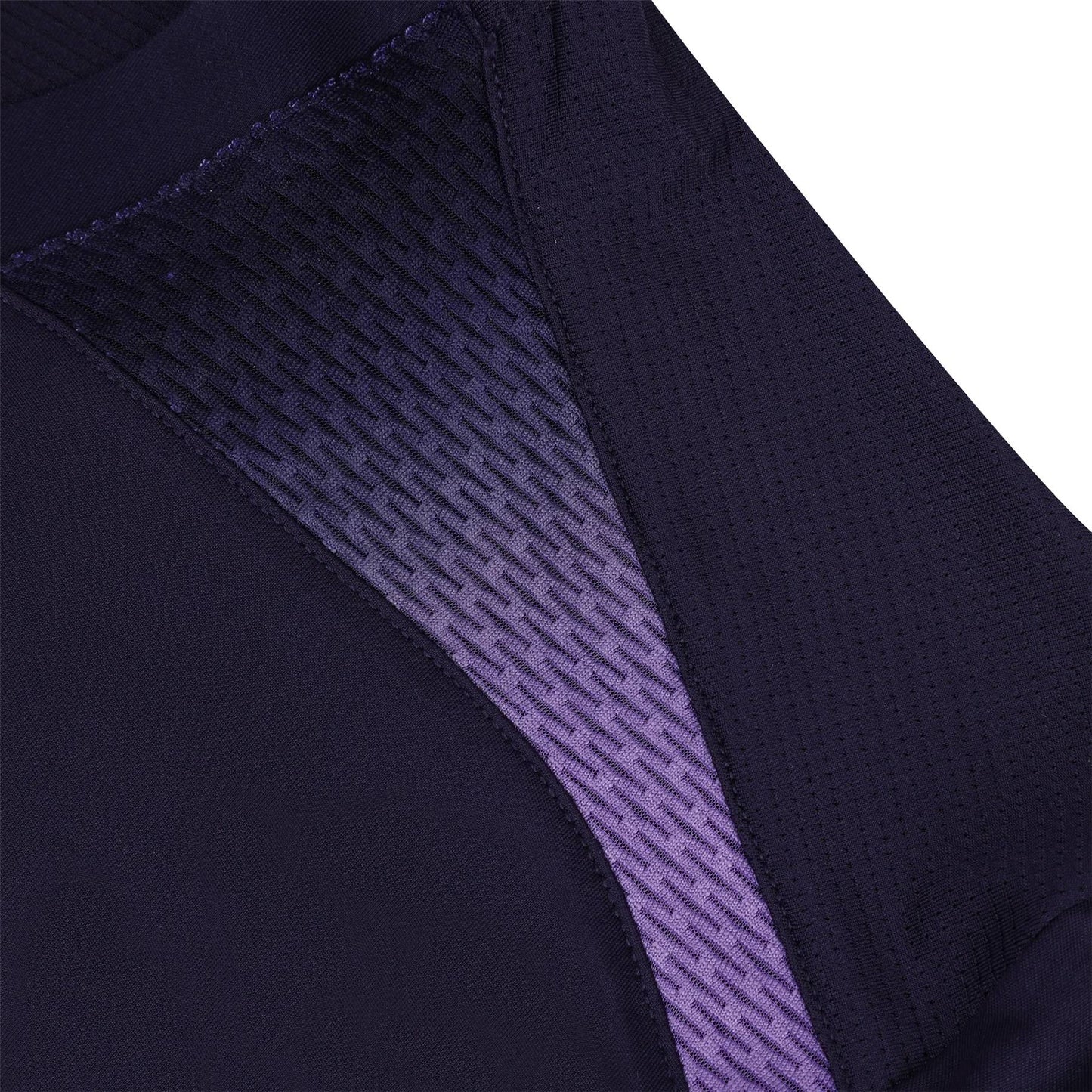 Close-up of the Le Coq Sportif Pro Men's Padel T-Shirt in Deep Purple, showcasing a dark athletic fabric with a textured gradient pattern that transitions from dark purple to light purple. Designed for active wearers, this material provides exceptional stretch and breathability.