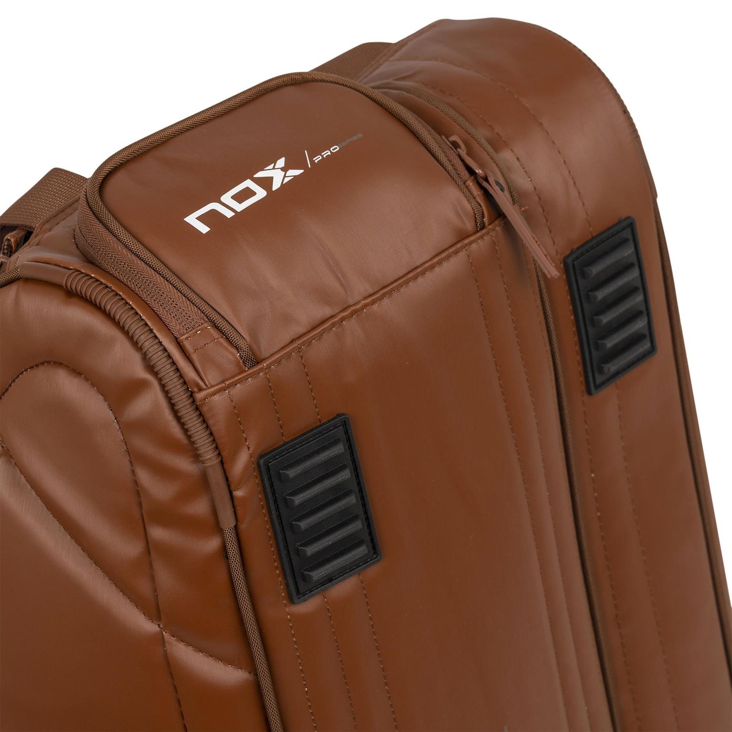 Close-up of the NOX Pro Series Padel Racket Bag - Camel by NOX, featuring black ventilation panels, a top zipper, white NOX Pro logo, ThermoTech protection technology, and a 45L capacity.